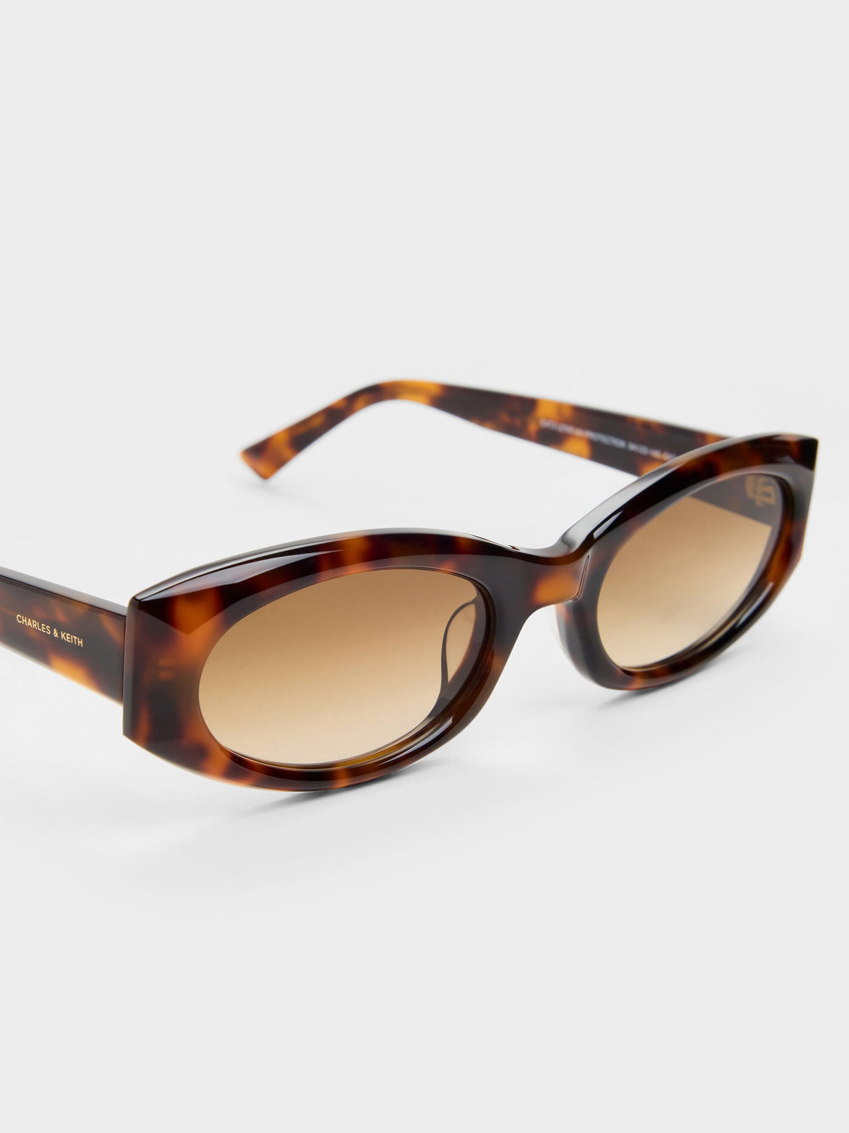 CHARLES & KEITH Sale / Aubrey Oval Sunglasses - T. Shell
